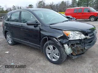 2011 Honda CR-V LX with VIN 5J6RE4H34BL099237, listed as a IAAI auction lot 41966339 with 135,744 mi miles. Bid and sale history available at carsss.com. Image 1.