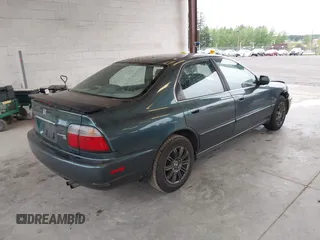 1997 Honda Accord EX with VIN 1HGCD5669VA090505, listed as a IAAI auction lot 42138093 with 207,191 mi miles and . Bid and sale history available at carsss.com. Image 4.