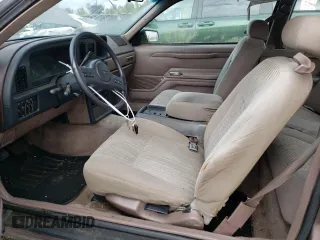 1987 Ford Thunderbird with VIN 1FABP6036HH185658, listed as a Copart auction lot 76998984 with 0 mi miles and Clean Title. Bid and sale history available at carsss.com. Image 7.