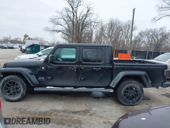 2023 Jeep Gladiator Overland with VIN 1C6HJTFG4PL564093, listed as a IAAI auction lot 41594203 with 37,740 mi miles and . Bid and sale history available at DreamBid. Image 14.
