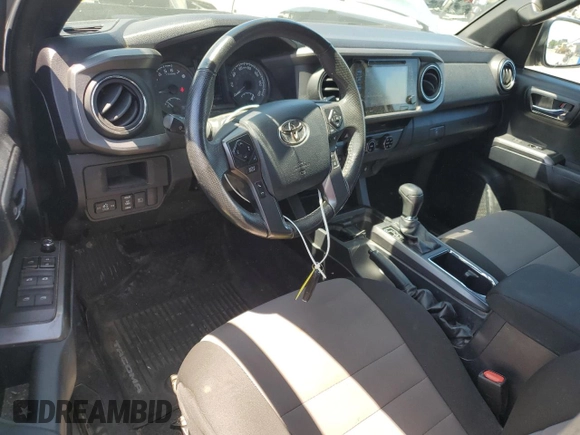 2018 Toyota Tacoma SR with VIN 3TMCZ5AN6JM129370, listed as a Copart auction lot 63042425 with 65,189 mi miles and Salvage title. Bid and sale history available at DreamBid. Image 8.