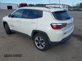 2020 Jeep Compass Limited with VIN 3C4NJDCB8LT127027, listed as a IAAI auction lot 41724110 with 94,896 mi miles and . Bid and sale history available at DreamBid. Image 3.
