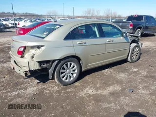 2010 Chrysler Sebring Limited with VIN 1C3CC5FD8AN194636, listed as a IAAI auction lot 41664232 with 139,264 mi miles and . Bid and sale history available at DreamBid. Image 4.
