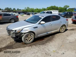 2011 Kia Optima LX z VIN KNAGM4A74B5090634, wystawiony jako Copart lot #52750385 z przebiegiem 205 804 mil mil oraz Szkoda całkowita • Salvage title. Historia ofert i sprzedaży dostępna na DreamBid. Obrazek 1.