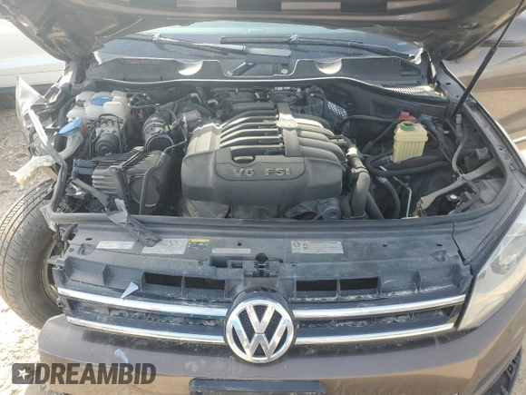 2013 Volkswagen Touareg Exec z VIN WVGEF9BP7DD009467, wystawiony jako Copart lot #47492725 z przebiegiem 109 511 mil mil oraz Szkoda całkowita • Salvage title. Historia ofert i sprzedaży dostępna na DreamBid. Obrazek 12.