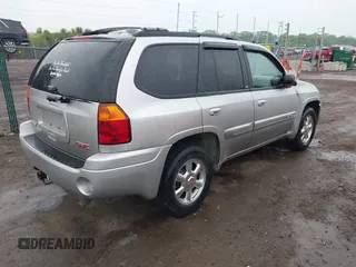 2004 GMC Envoy SLT z VIN 1GKDT13S742130352, wystawiony jako IAAI lot #42355072 z przebiegiem 170 355 mil mil oraz . Historia ofert i sprzedaży dostępna na DreamBid. Obrazek 4.