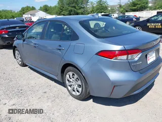 2021 Toyota Corolla LE with VIN JTDEPMAE7MJ144664, listed as a IAAI auction lot 42269698 with 23,500 mi miles and . Bid and sale history available at DreamBid. Image 3.