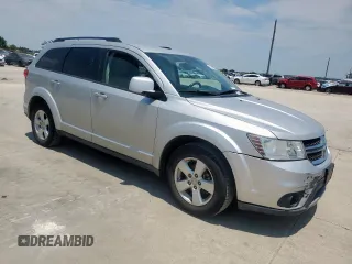 2012 Dodge Journey SXT with VIN 3C4PDCBG1CT134375, listed as a Copart auction lot 61059305 with 165,913 mi miles and Salvage title. Bid and sale history available at DreamBid. Image 4.