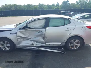 2015 Kia Optima LX with VIN 5XXGM4A75FG378795, listed as a IAAI auction lot 42604014 with 57,199 mi miles and . Bid and sale history available at DreamBid. Image 14.