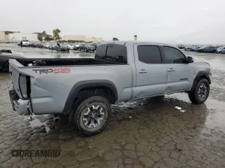 2021 Toyota Tacoma 4WD SR5 with VIN 3TMDZ5BN5MM098717, listed as a Copart auction lot 43877975 with 21,328 mi miles and Salvage Title. Bid and sale history available at carsss.com. Image 3.