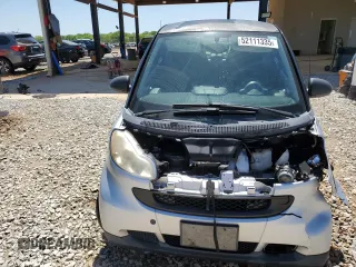 2009 Smart fortwo Pure with VIN WMEEJ31X49K224990, listed as a Copart auction lot 52111335 with 72,317 mi miles and Salvage Title. Bid and sale history available at carsss.com. Image 5.