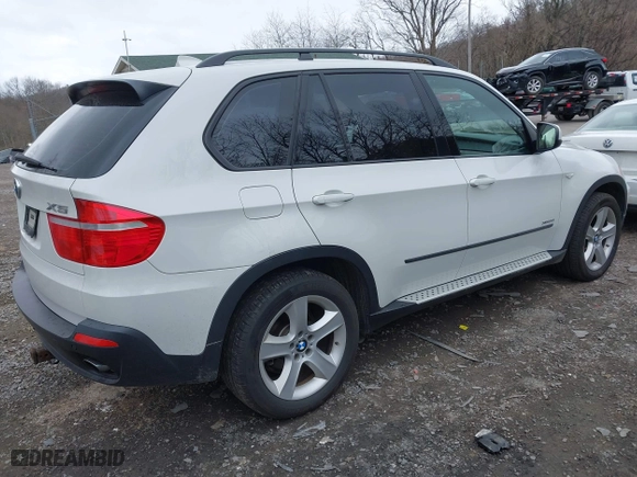 2009 BMW X5 30i with VIN 5UXFE43569L275733, listed as a IAAI auction lot 41897558 with 154,192 mi miles. Bid and sale history available at carsss.com. Image 4.
