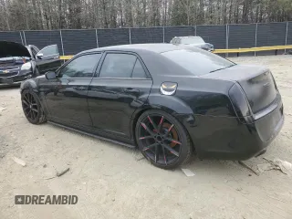 2014 Chrysler 300 with VIN 2C3CCABG7EH222370, listed as a Copart auction lot 46653055 with 121,983 mi miles and Salvage Title. Bid and sale history available at carsss.com. Image 2.