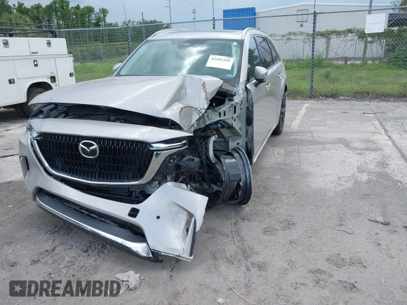 2024 Mazda CX-90 S с VIN JM3KK1HC0R1135680, выставлен на аукционе IAAI как лот 42492399 с пробегом 38 940 миль миль и . История ставок и продаж доступна на DreamBid. Изображение 18.