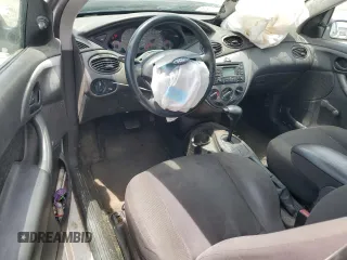 2003 Ford Focus ZX3 with VIN 3FAFP31383R117755, listed as a Copart auction lot 60668725 with 135,856 mi miles and Salvage title. Bid and sale history available at DreamBid. Image 8.