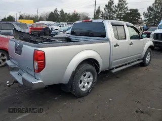 2010 Nissan Frontier SE with VIN 1N6AD0FVXAC420020, listed as a Copart auction lot 87324794 with 145,566 mi miles and Salvage title. Bid and sale history available at DreamBid. Image 3.