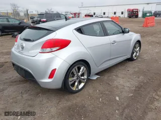 2016 Hyundai Veloster with VIN KMHTC6AD4GU270503, listed as a IAAI auction lot 41982520 with 137,282 mi miles. Bid and sale history available at carsss.com. Image 4.