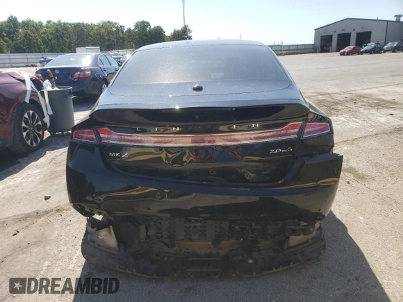 2016 Lincoln MKZ с VIN 3LN6L2G98GR615967, выставлен на аукционе Copart как лот 73792814 с пробегом 86 598 миль миль и Списание • Salvage title. История ставок и продаж доступна на DreamBid. Изображение 6.