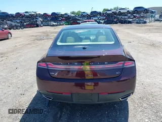 2013 Lincoln MKZ z VIN 3LN6L2GKXDR824996, wystawiony jako IAAI lot #42574204 z przebiegiem 81 370 mil mil oraz . Historia ofert i sprzedaży dostępna na DreamBid. Obrazek 16.