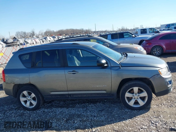 2012 Jeep Compass Latitude with VIN 1C4NJDEBXCD563543, listed as a IAAI auction lot 41711187 with 149,100 mi miles. Bid and sale history available at carsss.com. Image 13.