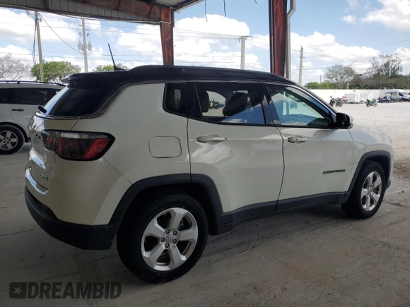 2019 Jeep Compass Altitude with VIN 3C4NJCBB0KT637477, listed as a Copart auction lot 57751005 with 94,316 mi miles and Clean title. Bid and sale history available at DreamBid. Image 3.