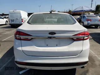 2017 Ford Fusion Hybrid SE z VIN 3FA6P0LU2HR209228, wystawiony jako Copart lot #62518055 z przebiegiem 119 174 mil mil oraz Szkoda całkowita • Salvage title. Historia ofert i sprzedaży dostępna na DreamBid. Obrazek 6.