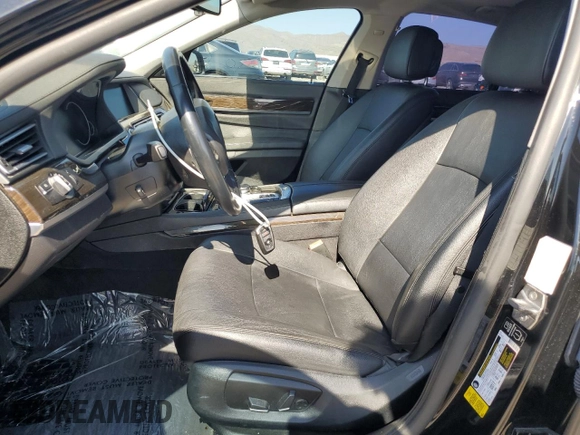 2015 BMW 7 Series 740i with VIN WBAYA6C5XFD826895, listed as a Copart auction lot 66889794 with Not Provided miles and Salvage Title. Bid and sale history available at DreamBid. Image 7.