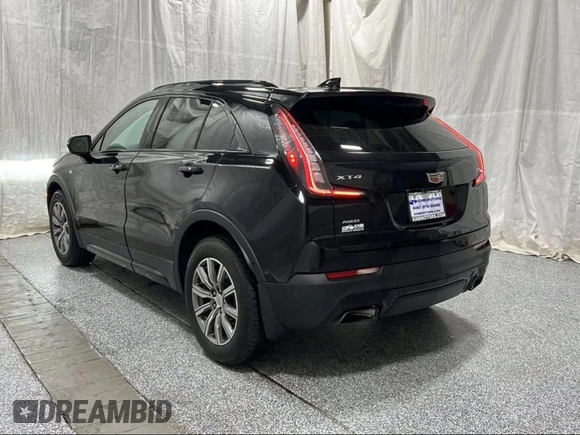 2019 Cadillac XT4 AWD Sport с VIN 1GYFZFR49KF139367, выставлен на аукционе Copart как лот 66960735 с пробегом 83 326 миль миль и Чистый • Clean title. История ставок и продаж доступна на DreamBid. Изображение 3.
