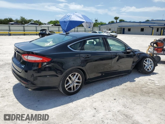 2016 Ford Fusion SE with VIN 3FA6P0HD2GR394517, listed as a Copart auction lot 63701495 with 122,976 mi miles and Salvage title. Bid and sale history available at DreamBid. Image 3.