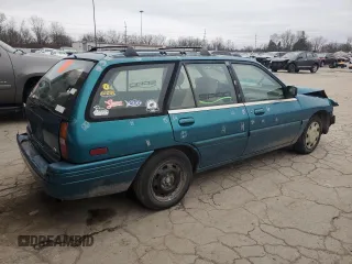 1994 Ford Escort z VIN 1FARP15J1RW125762, wystawiony jako Copart lot #85853184 z przebiegiem 75 229 mil mil oraz Szkoda całkowita • Salvage title. Historia ofert i sprzedaży dostępna na DreamBid. Obrazek 3.