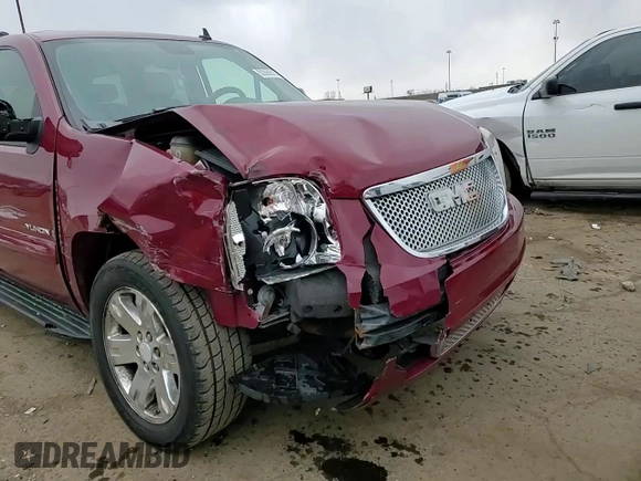 2007 GMC Yukon SLE z VIN 1GKFK13067J143436, wystawiony jako Copart lot #52290515 z przebiegiem 230 108 mil mil oraz Szkoda całkowita • Salvage title. Historia ofert i sprzedaży dostępna na DreamBid. Obrazek 12.
