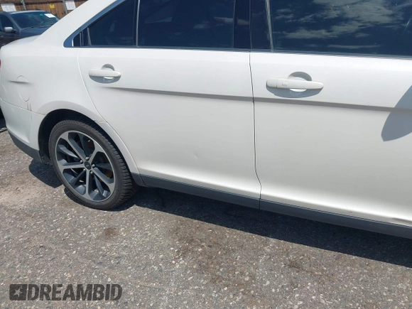2015 Ford Taurus SEL with VIN 1FAHP2H8XFG203309, listed as a IAAI auction lot 42598215 with 163,190 mi miles and . Bid and sale history available at DreamBid. Image 6.