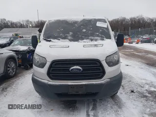 2016 Ford Transit Cargo z VIN 1FTYR2ZM7GKA78803, wystawiony jako IAAI lot #41364048 z przebiegiem 118 833 mil mil oraz . Historia ofert i sprzedaży dostępna na DreamBid. Obrazek 13.