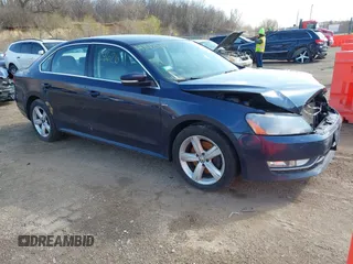 2015 Volkswagen Passat 1.8T Limited Edition with VIN 1VWAT7A33FC091945, listed as a IAAI auction lot 41930380 with 145,488 mi miles. Bid and sale history available at carsss.com. Image 1.
