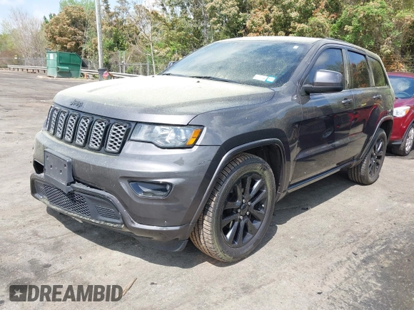 2019 Jeep Grand Cherokee Altitude with VIN 1C4RJFAG5KC854048, listed as a IAAI auction lot 41955935 with 93,972 mi miles and . Bid and sale history available at DreamBid. Image 2.