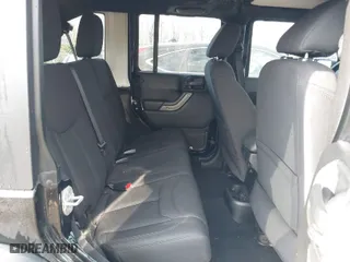 2013 Jeep Wrangler Unlimited Freedom Edition with VIN 1C4BJWDG8DL648870, listed as a IAAI auction lot 41909372 with 184,203 mi miles. Bid and sale history available at carsss.com. Image 8.