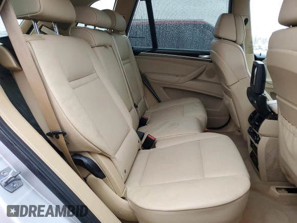 2013 BMW X5 xDrive35i z VIN 5UXZV4C54D0E10167, wystawiony jako Copart lot #86497414 z przebiegiem 95 519 mil mil oraz Szkody całkowita. Historia ofert i sprzedaży dostępna na DreamBid. Obrazek 11.