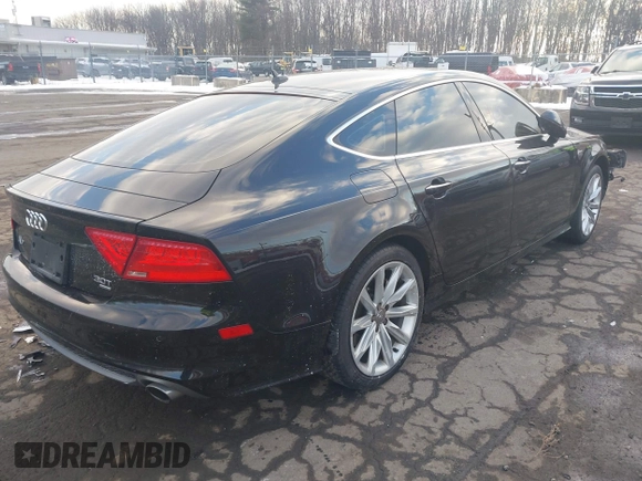 2013 Audi A7 Prestige with VIN WAU2GAFC1DN142732, listed as a IAAI auction lot 41396761 with 116,980 mi miles and . Bid and sale history available at DreamBid. Image 4.