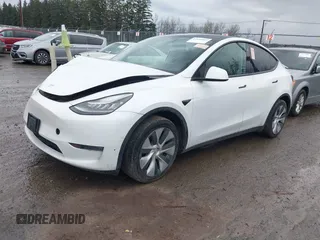 2021 Tesla Model Y Standard Range with VIN 5YJYGDED3MF103499, listed as a IAAI auction lot 41632064 with 132,846 mi miles and . Bid and sale history available at DreamBid. Image 2.