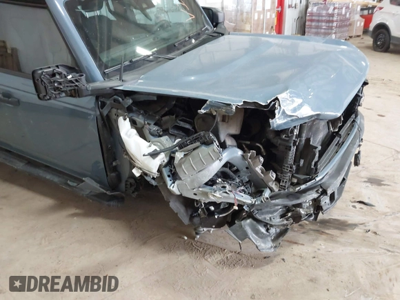 2023 Ford Bronco with VIN 1FMDE5BH2PLB16114, listed as a IAAI auction lot 41392107 with 37,400 mi miles and . Bid and sale history available at DreamBid. Image 1.