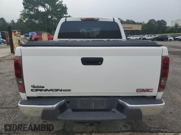 2007 GMC Canyon SLE1 z VIN 1GTDS13E678222966, wystawiony jako Copart lot #59161005 z przebiegiem 216 084 mil mil oraz Czysty tytuł • Clean title. Historia ofert i sprzedaży dostępna na DreamBid. Obrazek 6.