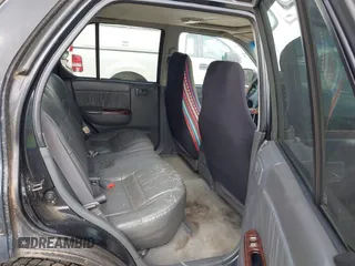1999 Honda Passport LX with VIN 4S6CK58W7X4410782, listed as a IAAI auction lot 41493176 with 276,257 mi miles. Bid and sale history available at carsss.com. Image 8.