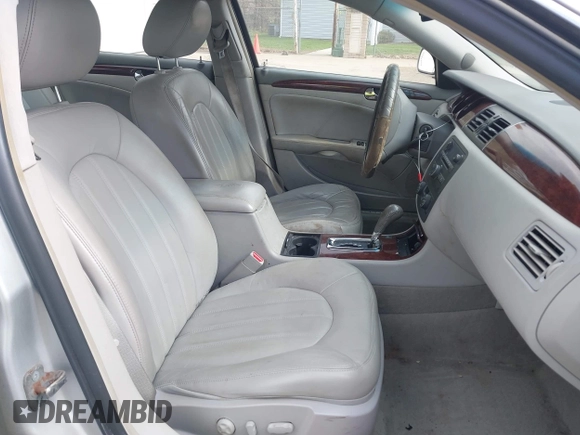 2009 Buick Lucerne CXL with VIN 1G4HD57M79U141033, listed as a IAAI auction lot 42061042 with 161,021 mi miles. Bid and sale history available at carsss.com. Image 5.