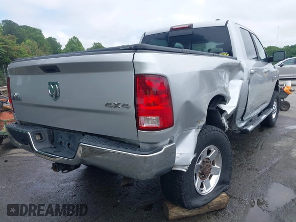 2010 Dodge 2500 SLT z VIN 3D7UT2CL9AG130789, wystawiony jako IAAI lot #42358839 z przebiegiem 128 802 mil mil oraz . Historia ofert i sprzedaży dostępna na DreamBid. Obrazek 4.