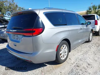 2021 Chrysler Pacifica Touring L with VIN 2C4RC1BG3MR560234, listed as a IAAI auction lot 40926673 with 27,830 mi miles and . Bid and sale history available at DreamBid. Image 4.