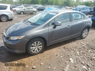 2012 Honda Civic LX z VIN 2HGFB2F58CH317836, wystawiony jako Copart lot #55795965 z przebiegiem 169 301 mil mil oraz Szkoda całkowita • Salvage title. Historia ofert i sprzedaży dostępna na DreamBid. Obrazek 1.
