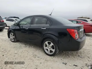 2012 Chevrolet Sonic LTZ z VIN 1G1JE5SB2C4173638, wystawiony jako Copart lot #84634474 z przebiegiem 148 247 mil mil oraz Szkoda całkowita • Salvage title. Historia ofert i sprzedaży dostępna na DreamBid. Obrazek 2.
