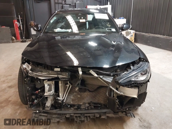 2021 Alfa Romeo Giulia Ti z VIN ZARFANBN7M7644482, wystawiony jako IAAI lot #42502199 z przebiegiem 27 962 mil mil oraz . Historia ofert i sprzedaży dostępna na DreamBid. Obrazek 6.