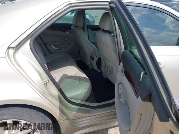 2013 Cadillac CTS Luxury with VIN 1G6DE5E55D0120843, listed as a IAAI auction lot 42145982 with 147,127 mi miles and . Bid and sale history available at DreamBid. Image 8.