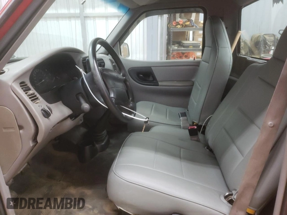 1999 Ford Ranger XL with VIN 1FTYR10C7XUB86230, listed as a Copart auction lot 83654704 with 229,728 mi miles and Salvage Title. Bid and sale history available at DreamBid. Image 7.
